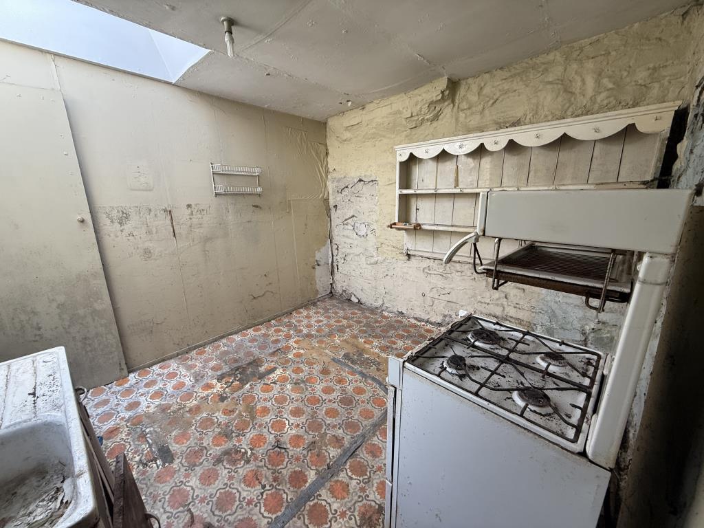 Lot: 70 - MID-TERRACE COTTAGE FOR REPAIR AND REFURBISHMENT - The kitchen